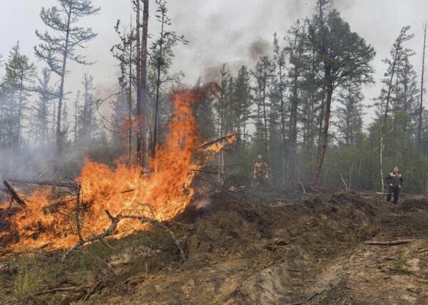 Wildfires in Russia s Siberia could endanger a power plant AP News